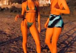Candice Swanepoel And Doutzen Kroes – Bikini Dance On The Beach